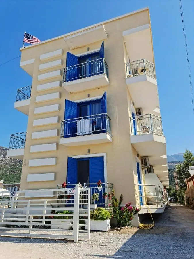 The blue-shuttered balconies on the side of Blue Horizon