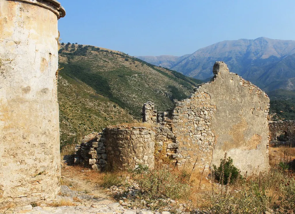 The ancient stone walls of Himarë Castle above the coast