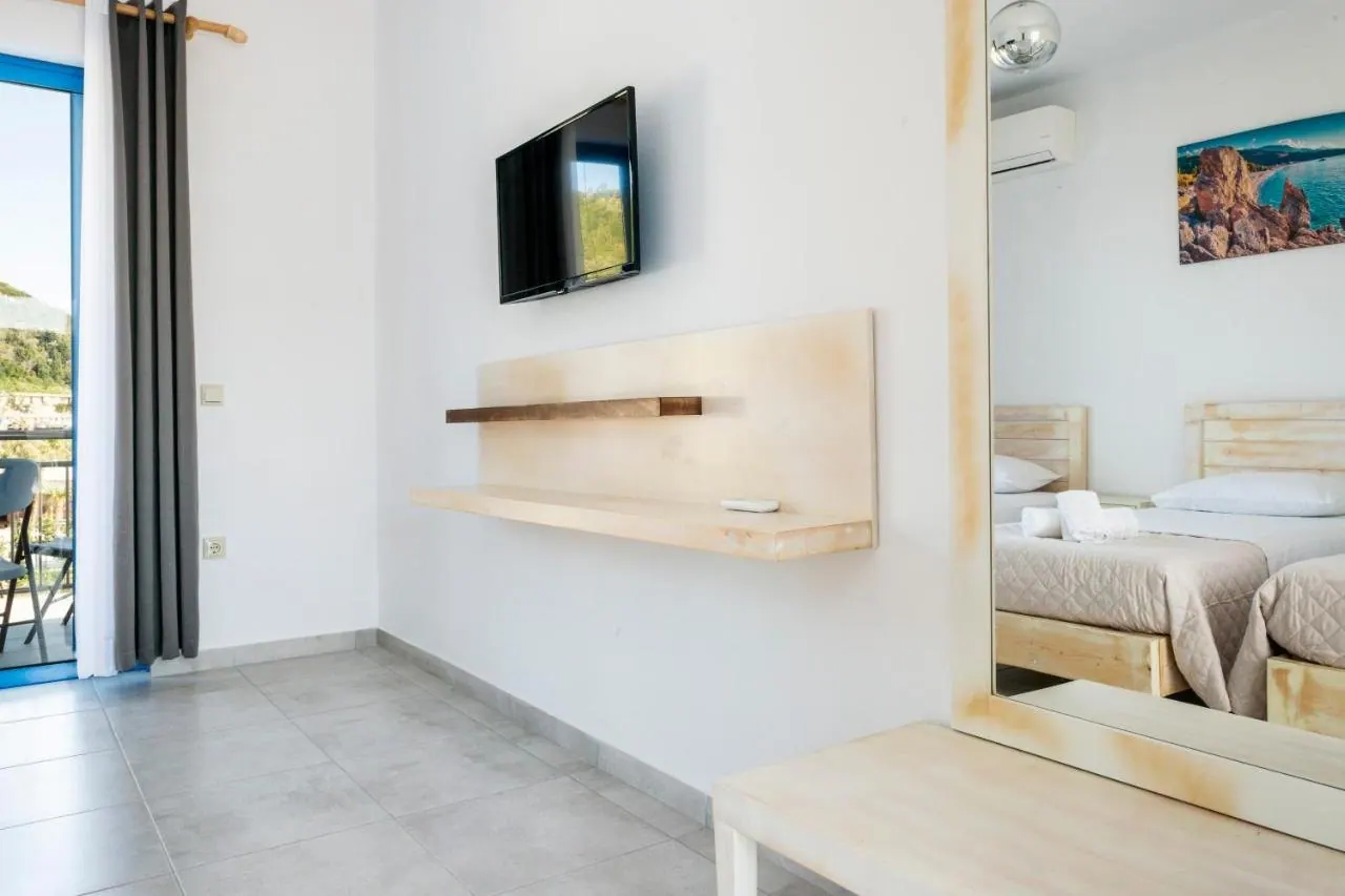 Bright room with a balcony and streaming TV