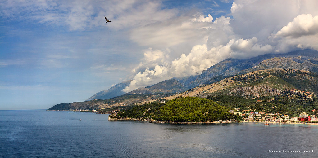 Himara bay seen from the Filikuri viewpoint — the Albanian Riviera coastline Americans fly 10+ hours to reach