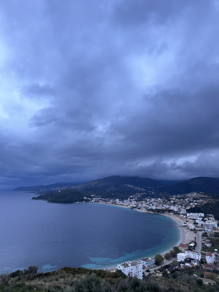 Aerial view of Himara bay and town center from above