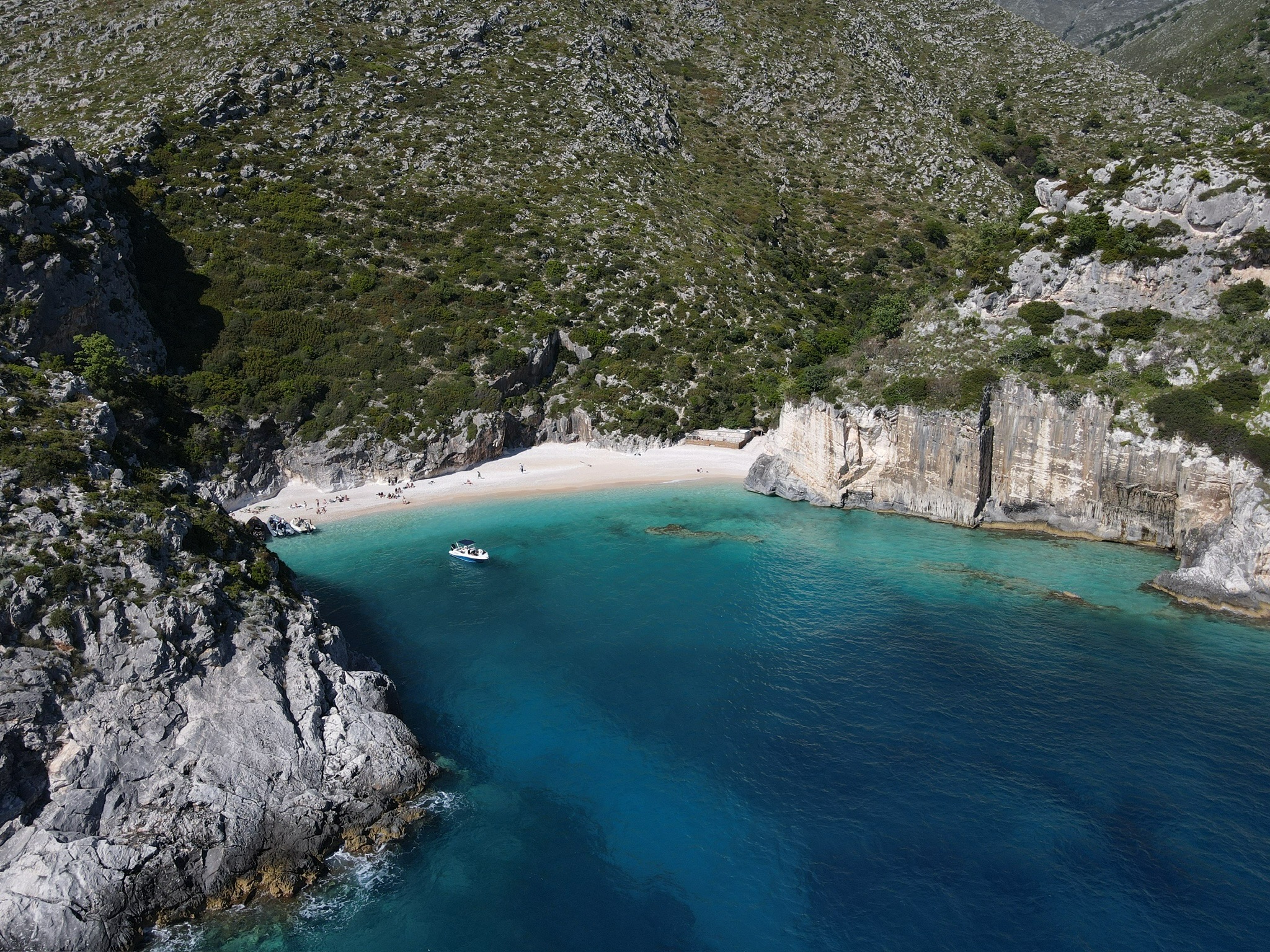 Aerial of the wild Karaburun cliffs facing the Adriatic, the coastline you sail past on the way to Sazan Island, Albania