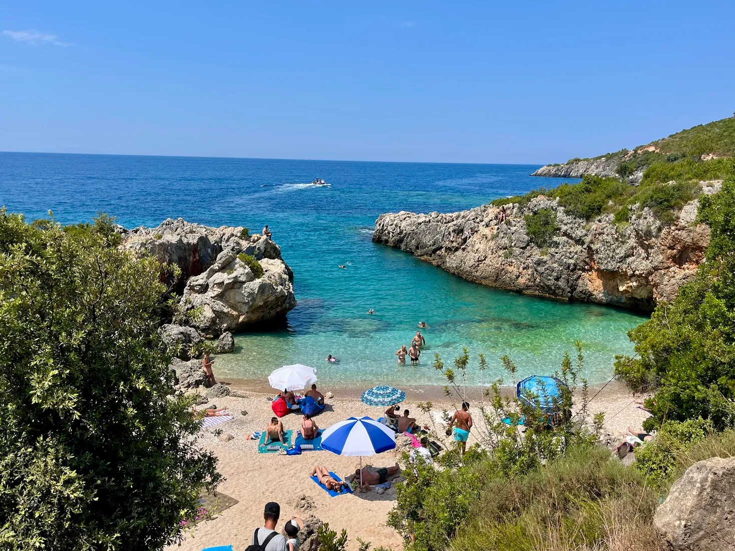 Akuarium Beach tiny cove with crystal-clear blue-turquoise water resembling an aquarium