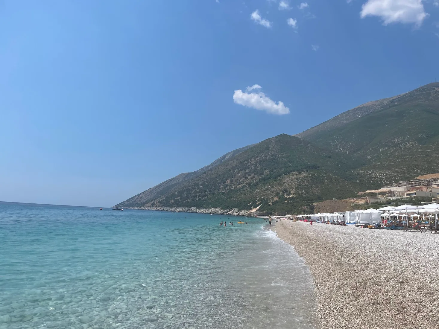 Palasa Beach with white pebbles and clear Ionian water at the northern end of the Albanian Riviera