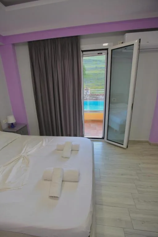 Quadruple Room with Sea View at Karos Hotel Llaman