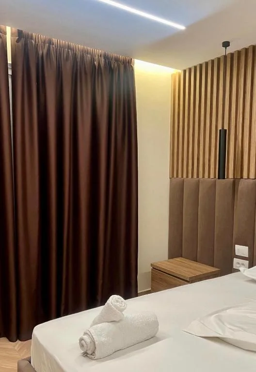 Triple Room with Balcony at Karos Hotel Llaman