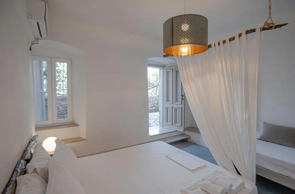 Triple Room with Garden View at Militiko Residence