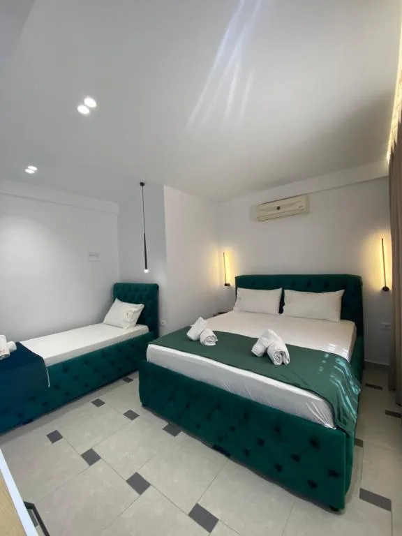Triple Room at Qeparo Napolon Complex