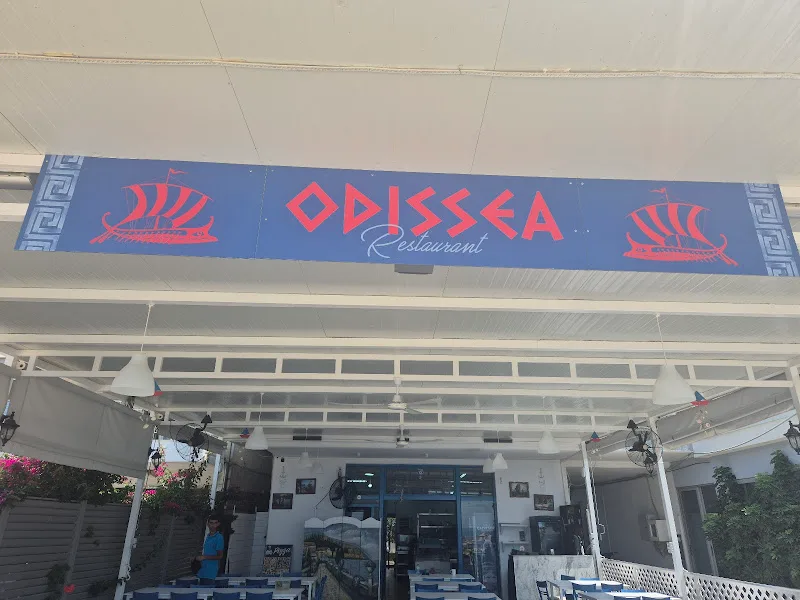 Entrance and signage of Restaurant Odissea in Himara