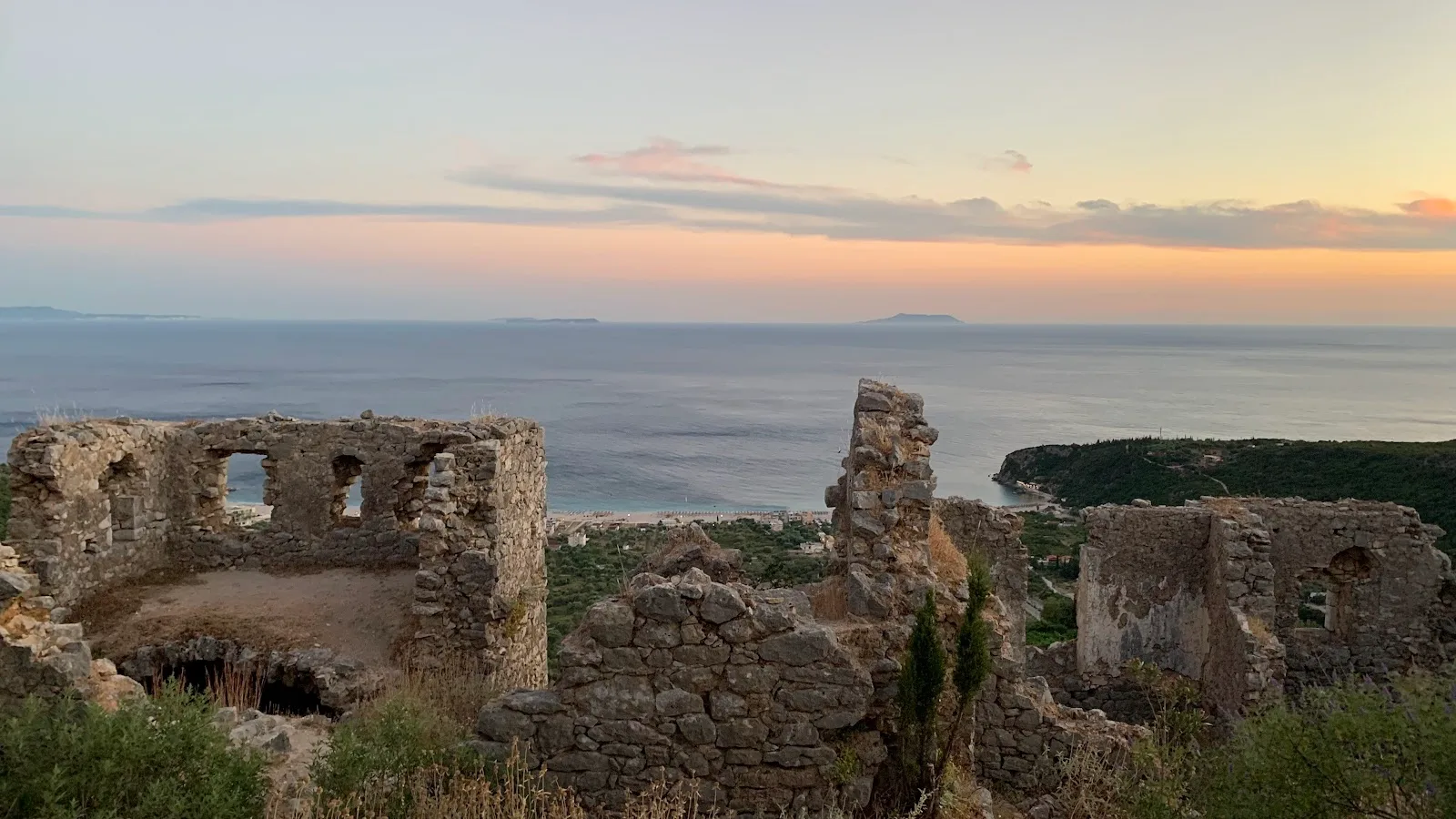 Stone walls and Byzantine church ruins at Himara Castle on Barbaka hill