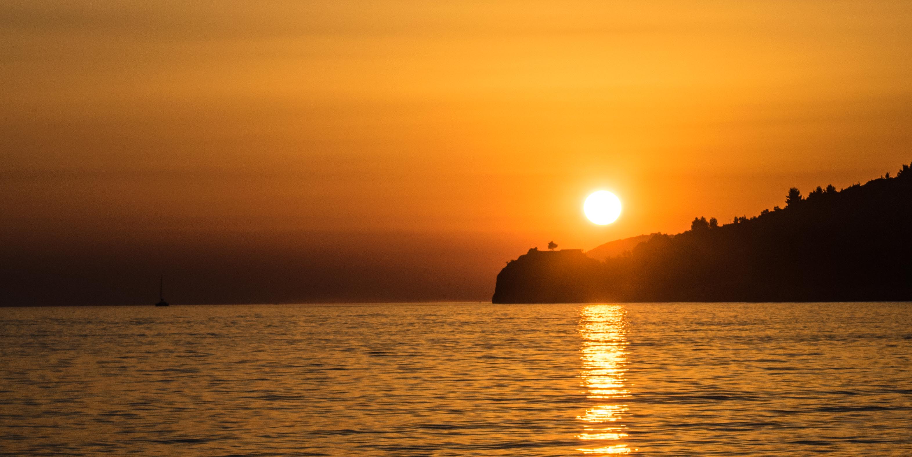 Sunset over the Ionian Sea near Potami Beach south of Himara