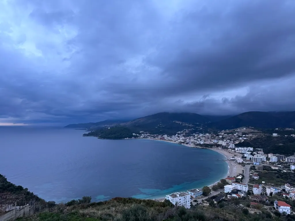 Sunset over Spile beach near Himara Downtown Hostel in town center