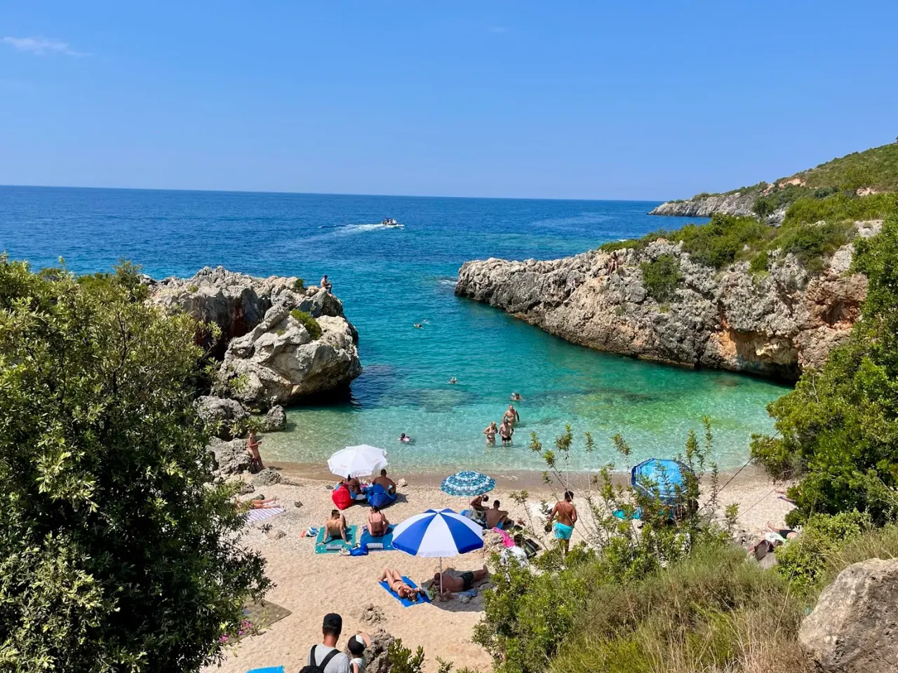 Akuarium Beach tiny cove with crystal-clear blue-turquoise water resembling an aquarium