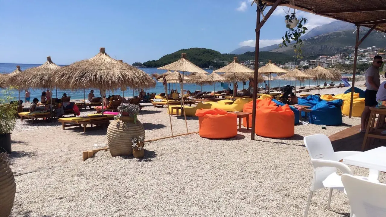 Varka Beach Bar's colorful bean bags and thatched umbrellas on Potami Beach