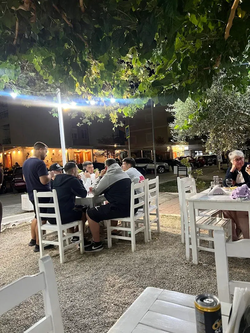 Evening diners at Brothers Grill outdoor taverna in Himara