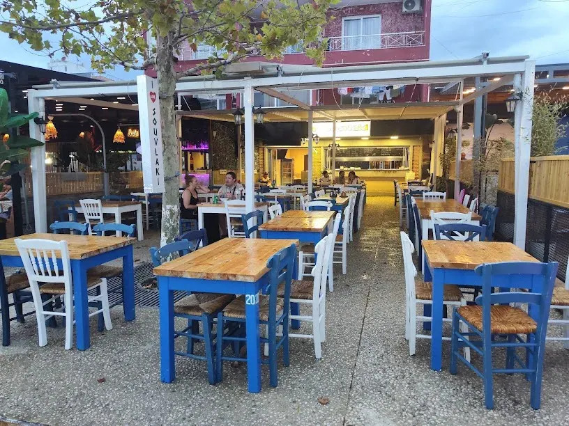 Outdoor taverna seating at I Love Souvlaki in Himara
