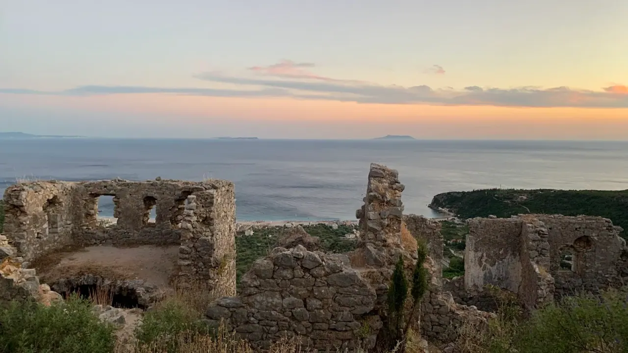 Stone walls and Byzantine church ruins at Himara Castle on Barbaka hill