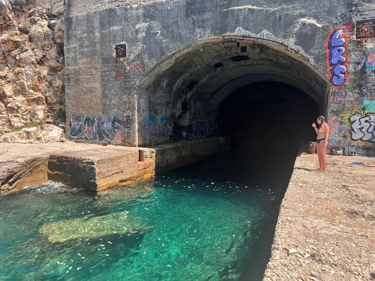 Abandoned military barracks above the Porto Palermo submarine base