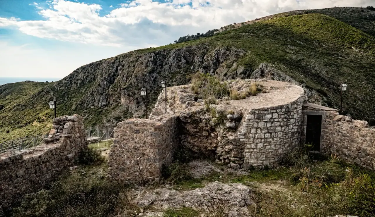 Stone walls and Byzantine church ruins at Himara Castle overlooking the coast