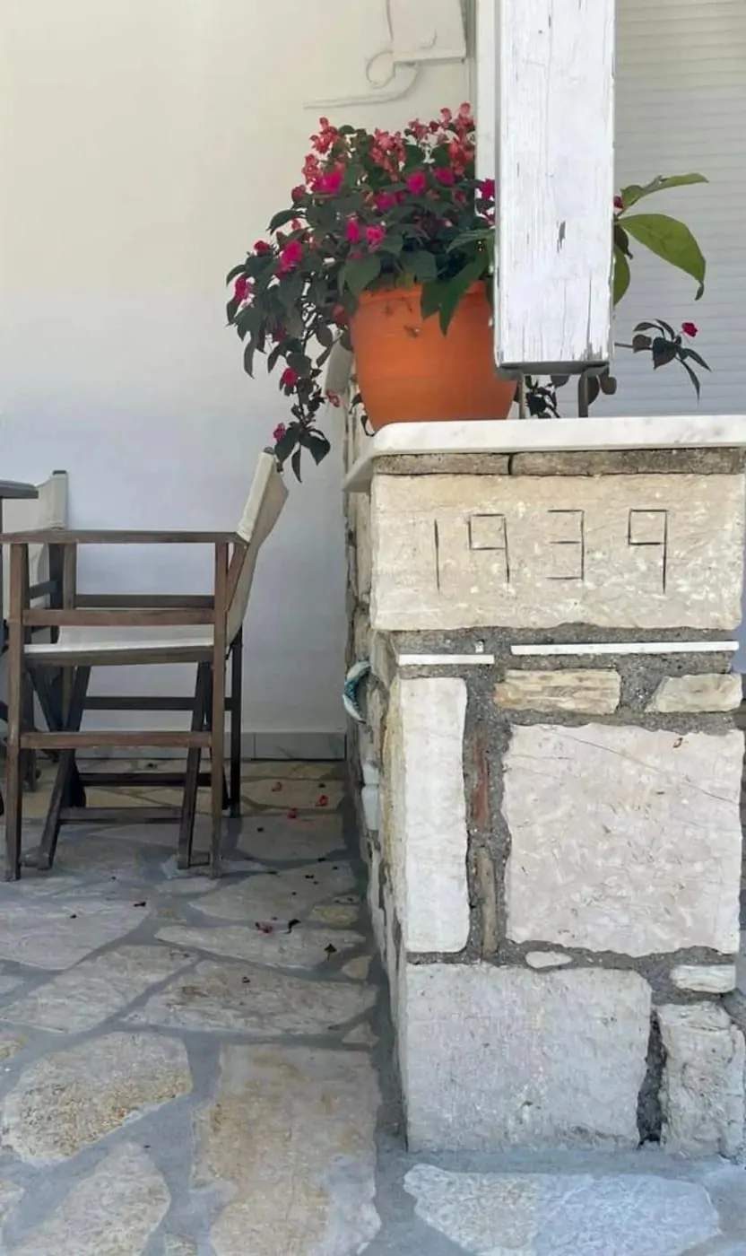 The date 1939 carved into a stone block in the terrace wall