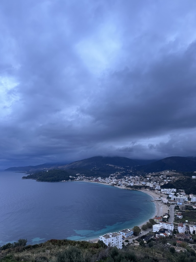 Albanian Riviera coastline view with turquoise water and mountain backdrop