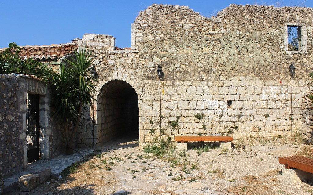 Stone entrance arch at Himara Castle in the old town