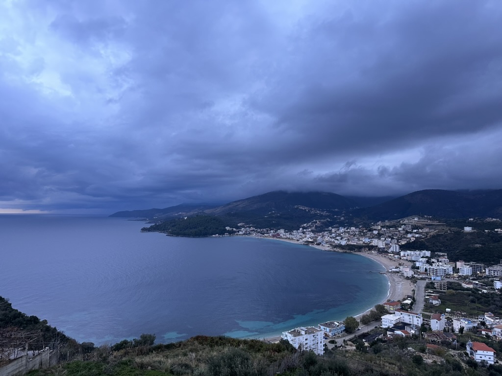 Sunset over Spile beach near Himara Downtown Hostel in town center
