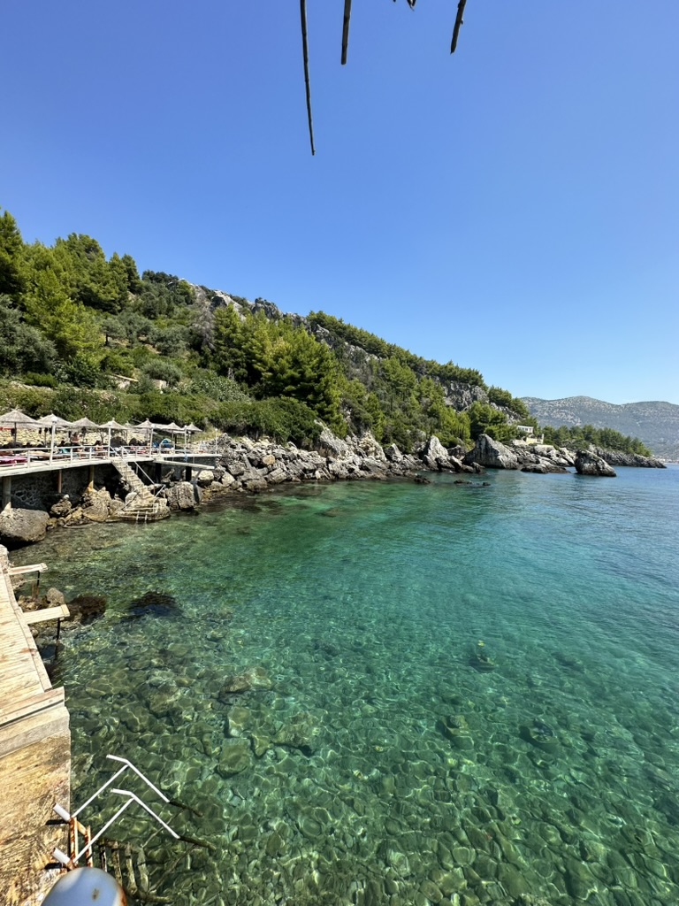 Sunset over Potami area near Himara showing affordable dining options