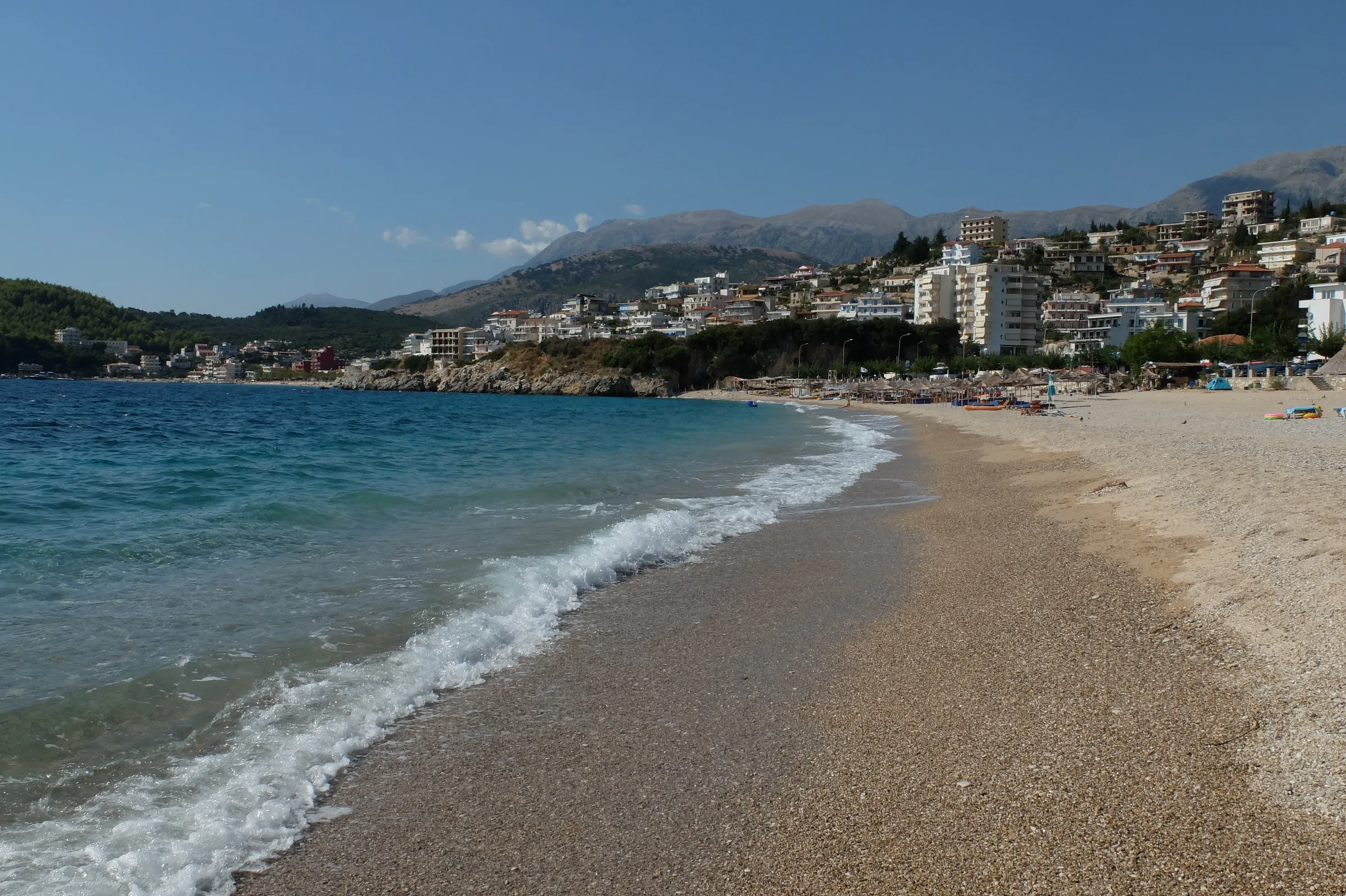 Albanian Riviera coastline view with turquoise water and mountain backdrop
