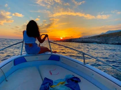 Sunset over the Ionian Sea from a boat off the Himara coast