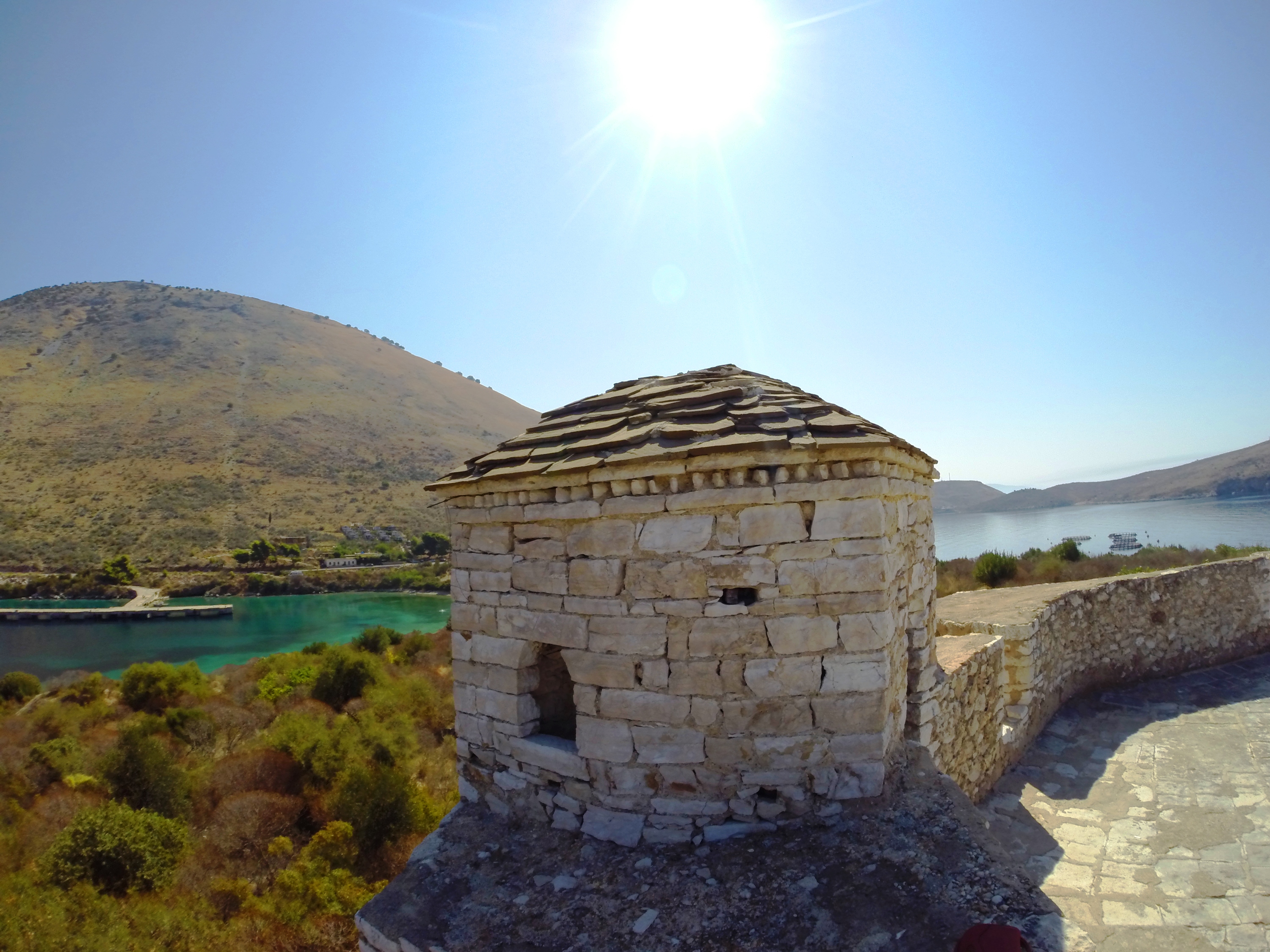 Porto Palermo Castle on its peninsula overlooking the turquoise bay, one of many landmarks near Himara
