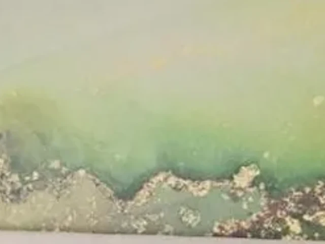 The painted panel behind the twin at Hotel Potami, photographed close