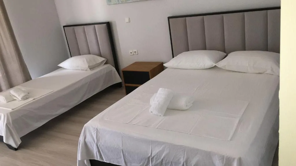 Deluxe Triple Room with Sea View at IRINI Boutique Rooms