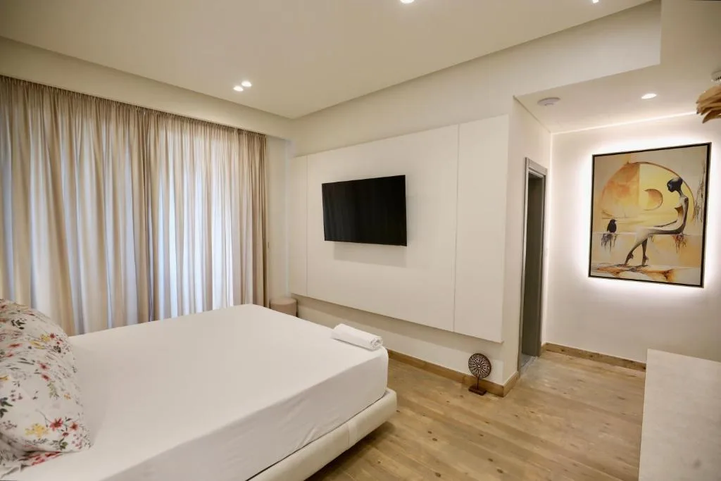 Deluxe Double Room with Side Sea View at Manolo & Jolie Luxury Villa