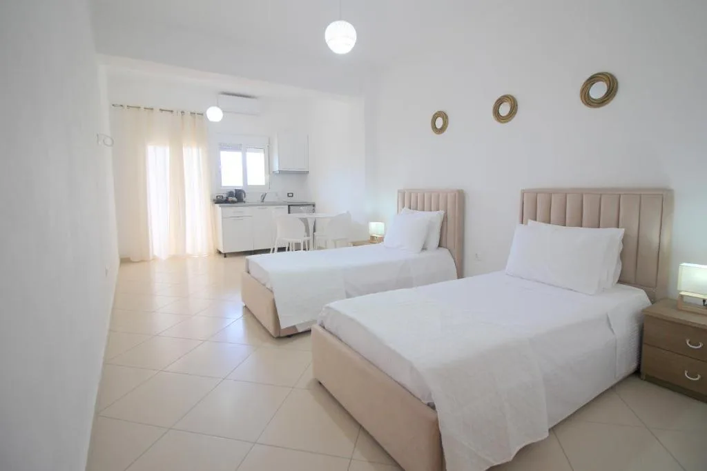 Quadruple Room with Balcony and Sea View at Nefeli's Apartment