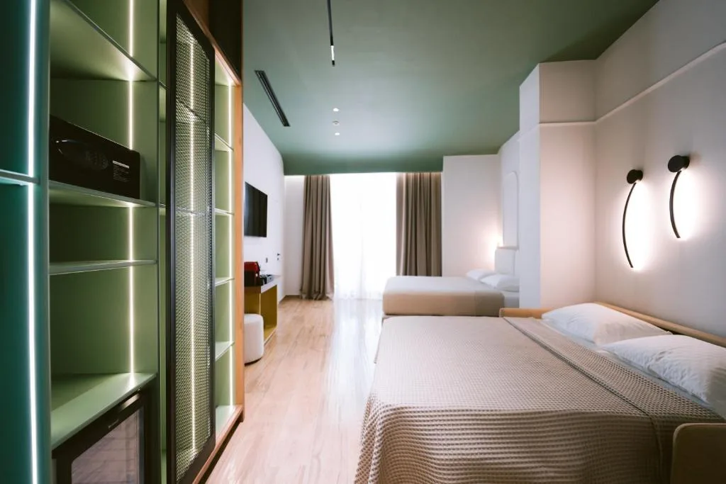 Family Room with Balcony at Noemie Hotel