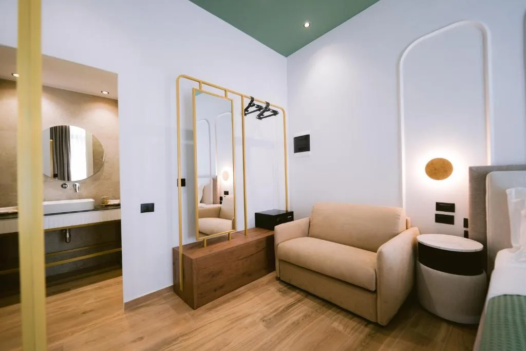 Triple Room with Balcony at Noemie Hotel