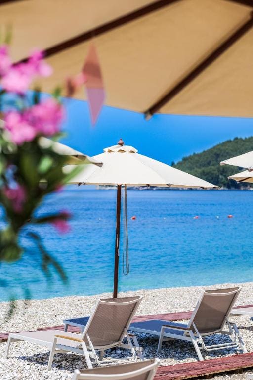 Exterior view of Rapo's Resort Hotel on Livadhi Beach in Himara