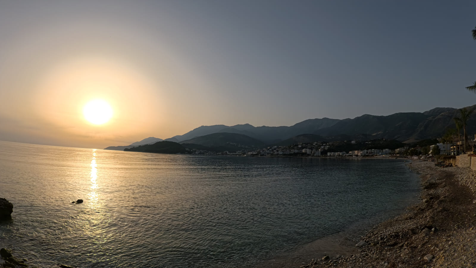 The same bay later the same evening, the sun lower over the water and the light gone flat on the far shore
