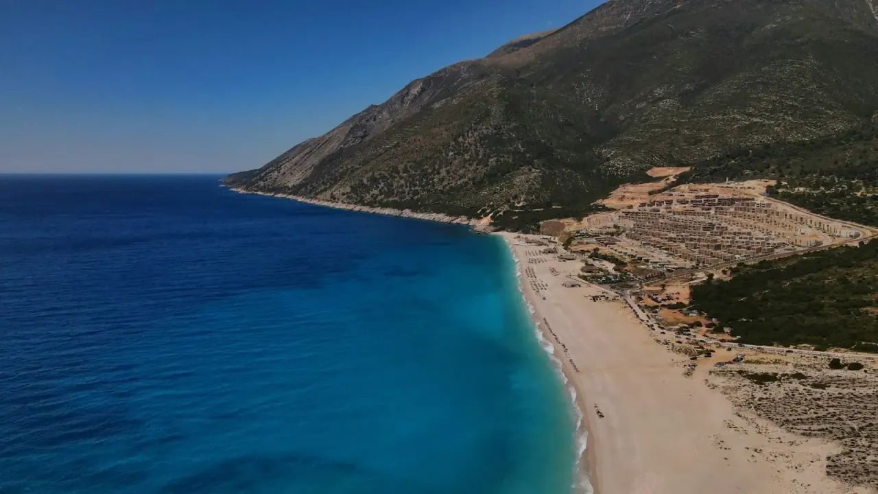 Coastal village landscape tied to traditional Albanian polyphonic singing culture