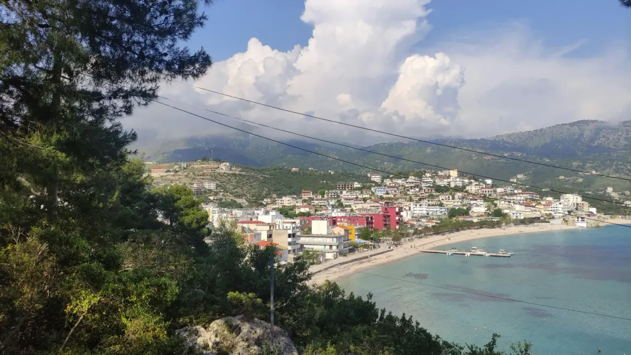 Himara Spile beach and old town coastline in early spring light