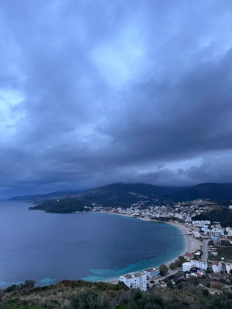 Himara Spile coastline during quiet winter months with muted sunset light