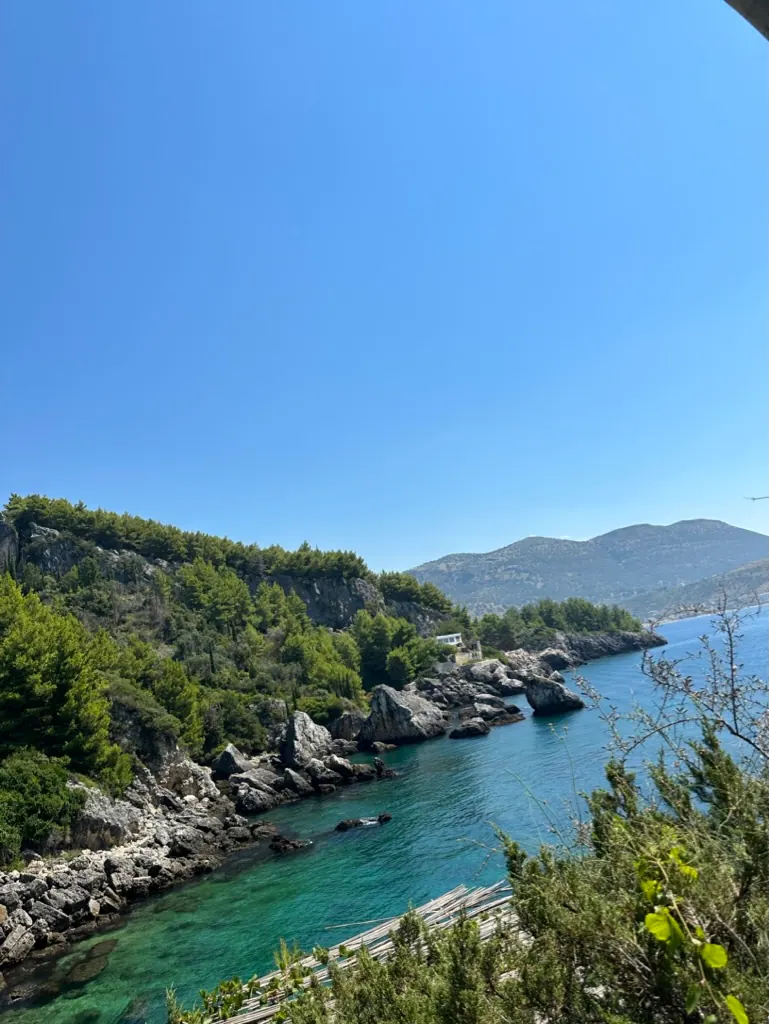 Aerial view of Himara bay and Spile peninsula for long-stay rental planning