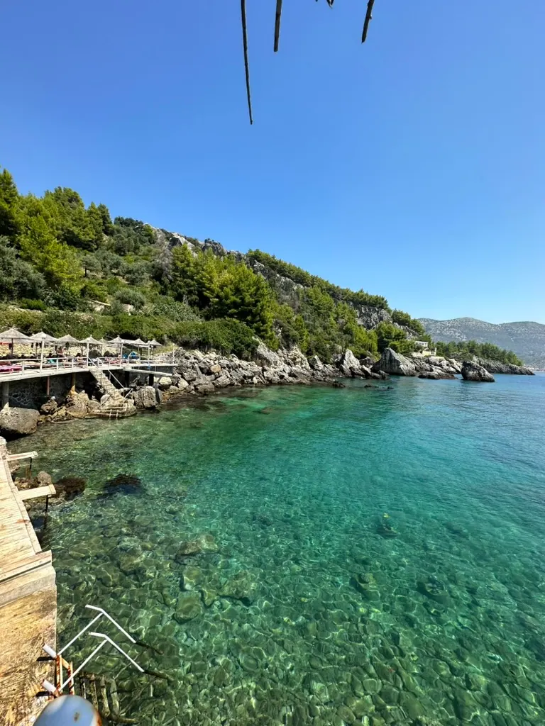 Sunset over Potami area near Himara showing affordable dining options