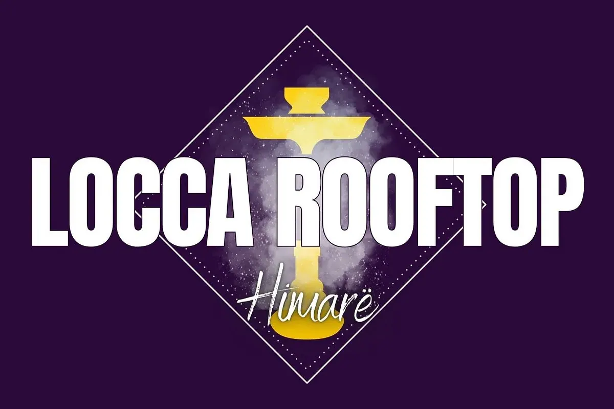 Locca Rooftop terrace with its neon heart sculpture and signage overlooking Himara bay