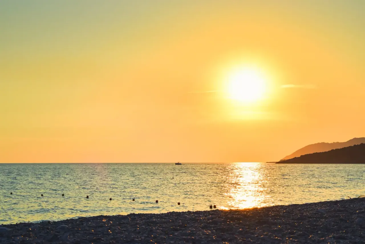 Golden sunset over Livadhi Beach on the Albanian Riviera