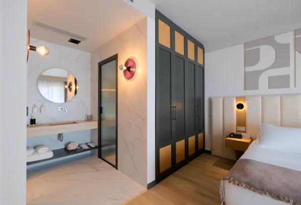 The Family Room bathroom, marble with a glazed shower