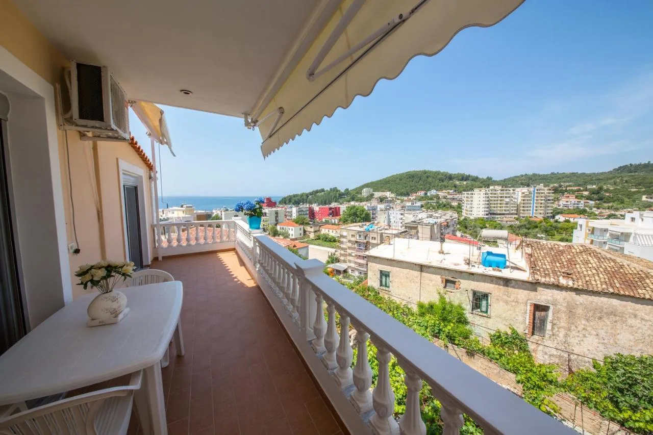 The balustraded terrace at Himara Apartments looking over Spile's roofs to the sea
