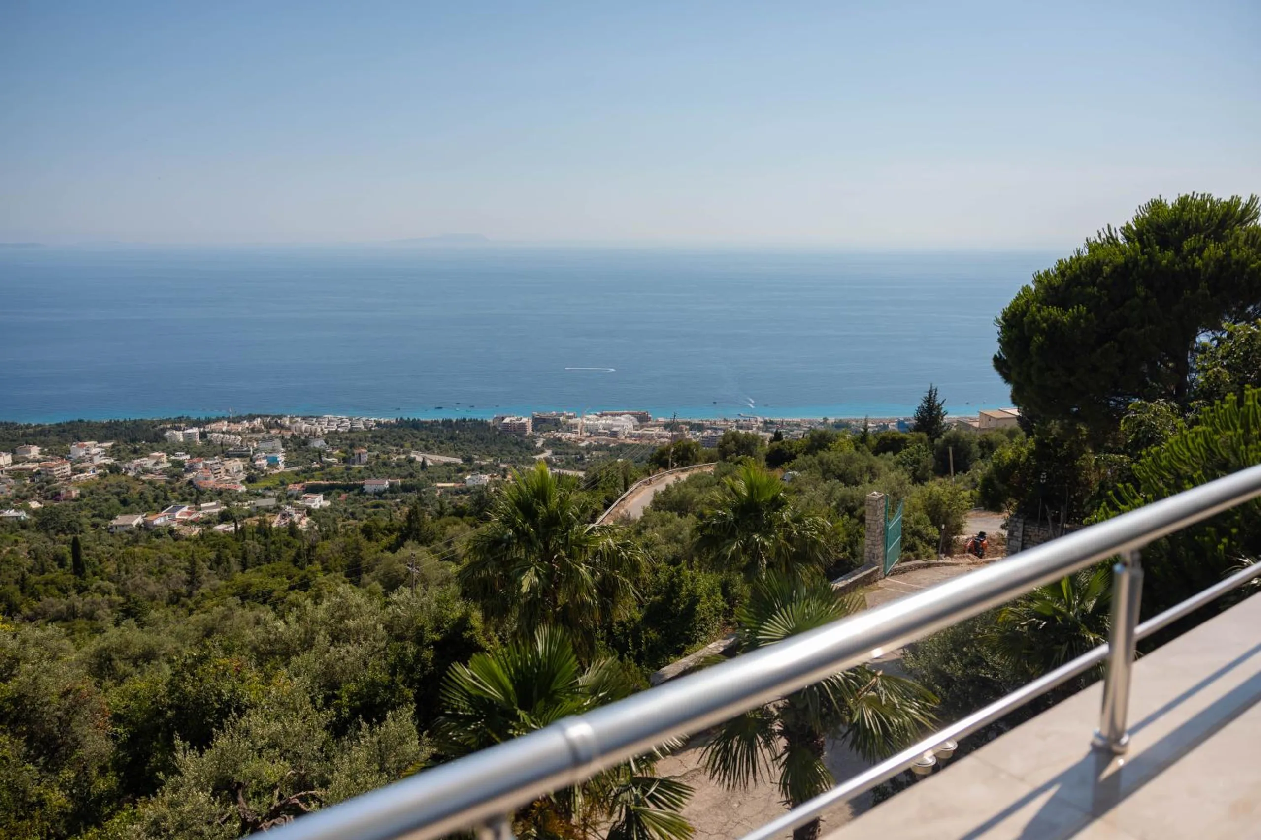 The view from a balcony at Hotel Palasa above Palasë down over Drymades to the Ionian Sea