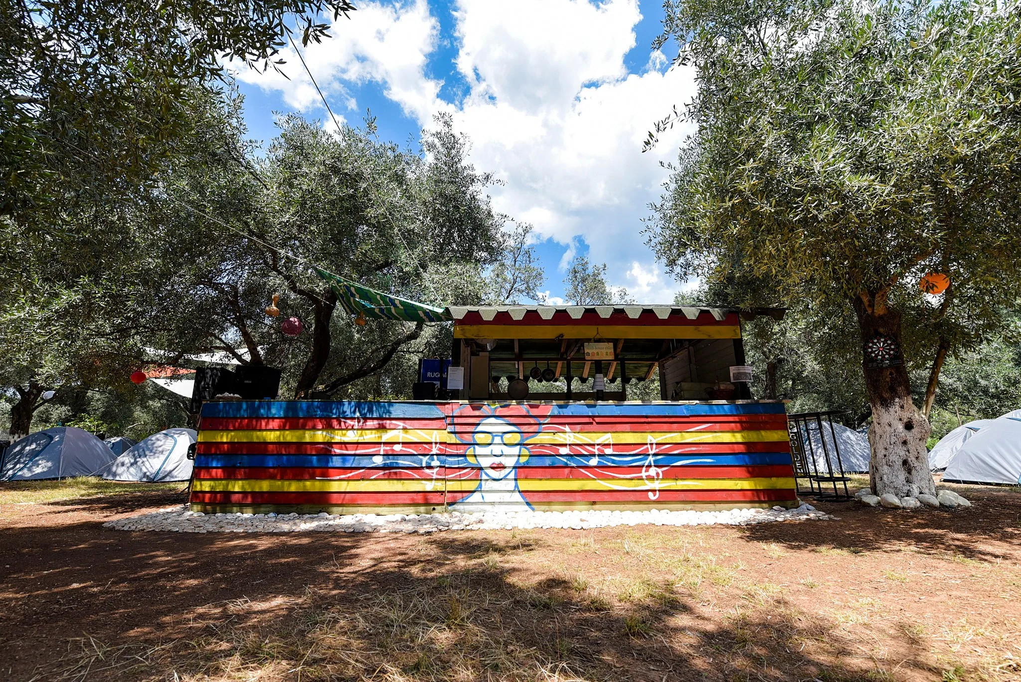 The painted counter at Valdrin's Camping under the olive trees above Jalë, Himara